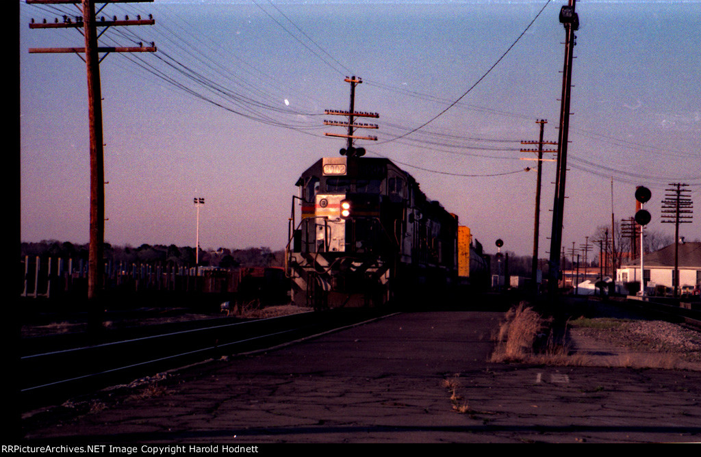 SBD 8002 leads a southbound train past the station